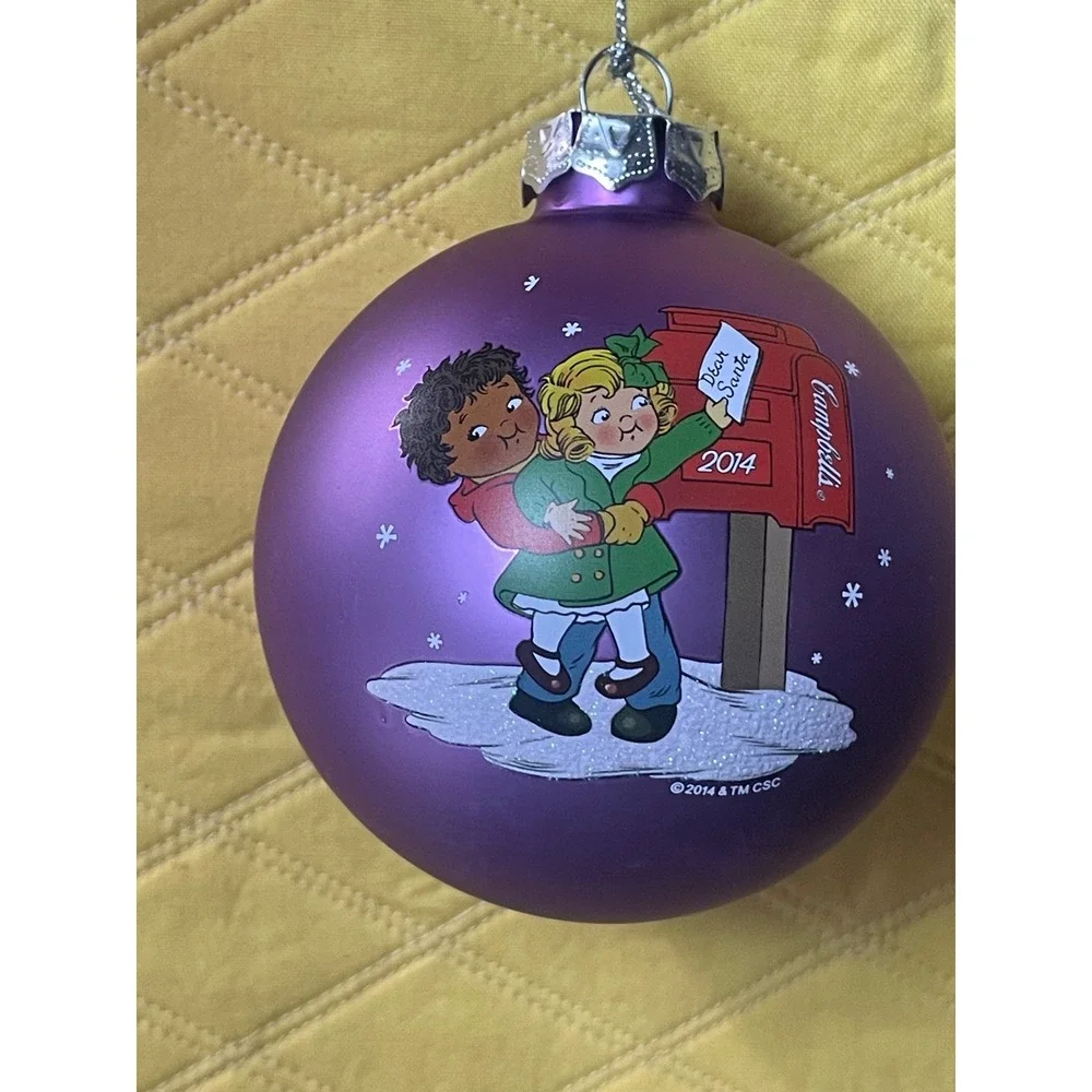 Campbells Soup Kids 2014 Christmas Ball Ornament Purple Satin Glass Glitter 3in